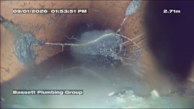 Camera footage showing fine roots growing into a pipe, 2.71 metres along