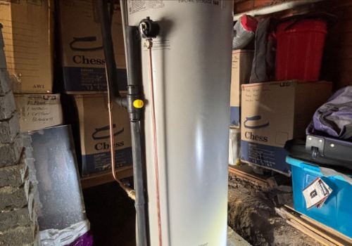 Replacement hot water system installed in a garage