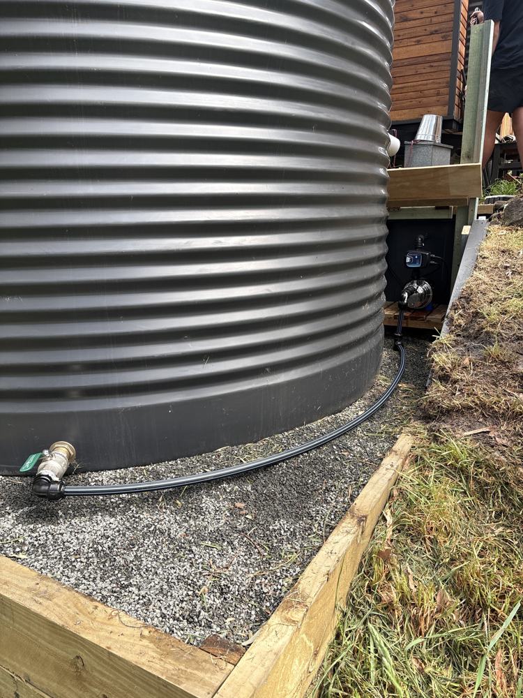 New outlet line from a rainwater tank to a pressure pump
