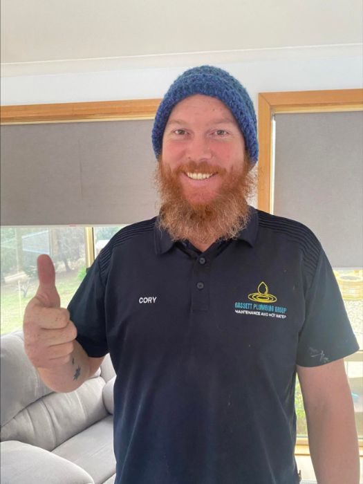Cory from Bassett Plumbing Group giving a thumbs up
