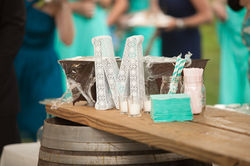 Wine barrel bar covered in burlap