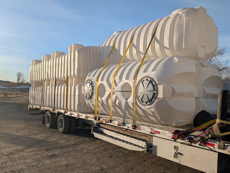 Truckload of Norwesco tanks