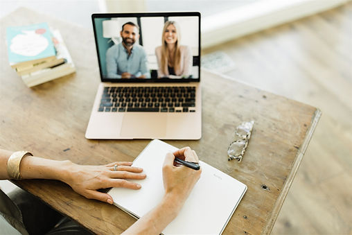 Online parent coaching with laptop on desk