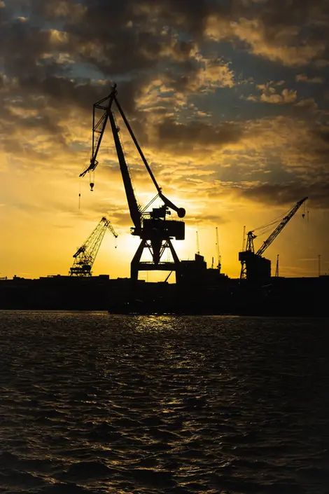 Harbor machinery in Gothenburgs sunset