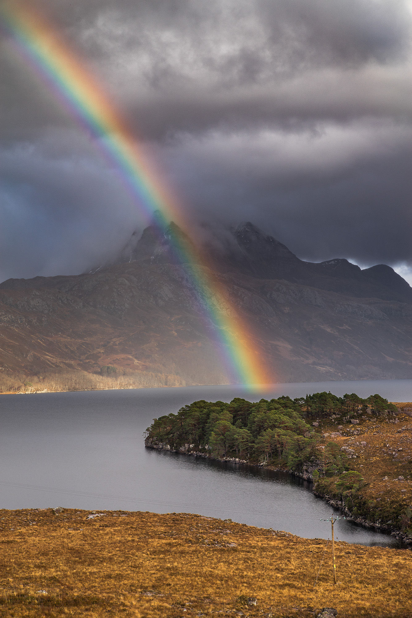 Rainbow striking through Slioch