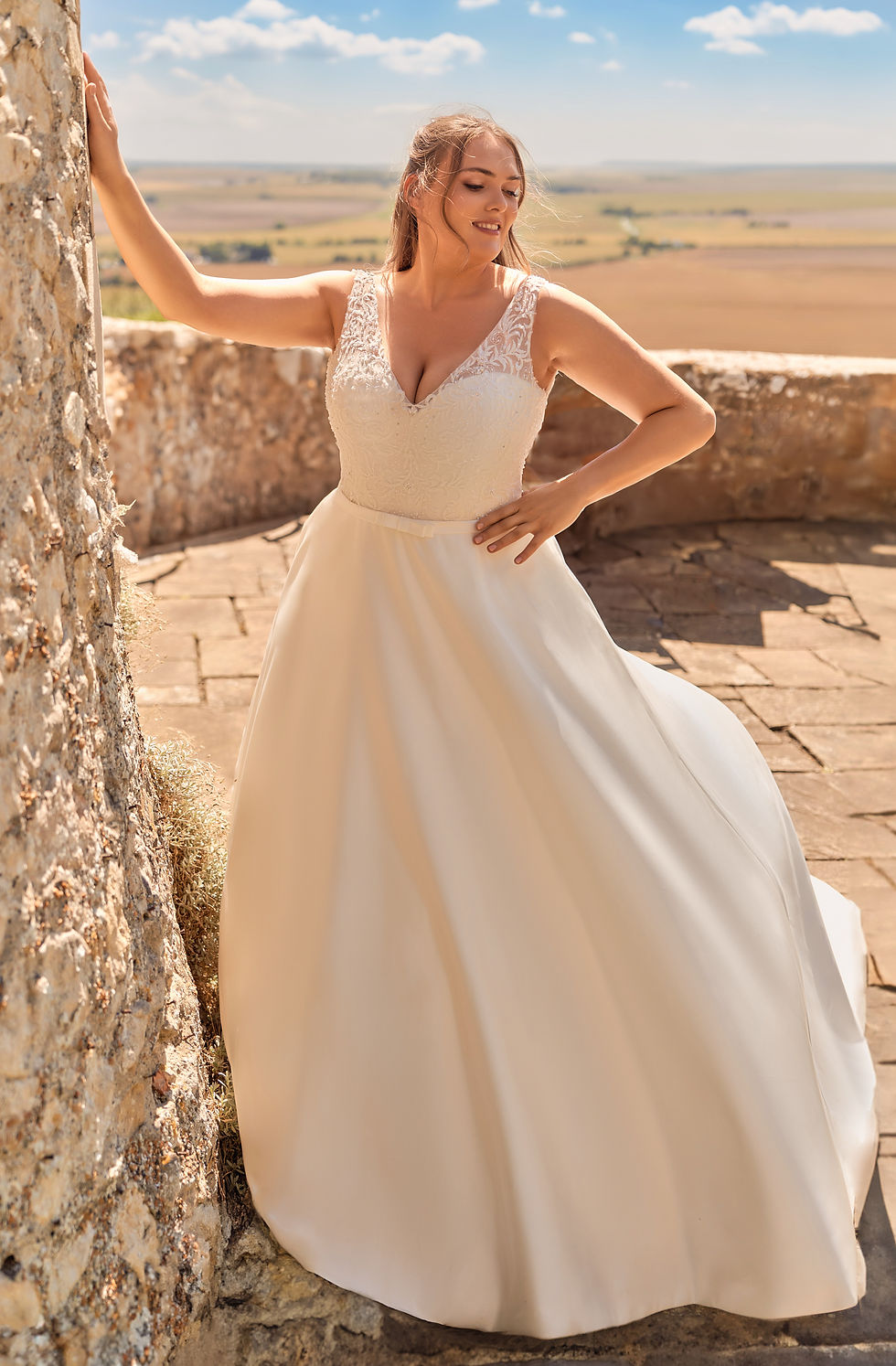 Thumbnail: Front view of Envy by Phoenix PH7004 plus-size satin A-line wedding dress with V-neck beaded bodice