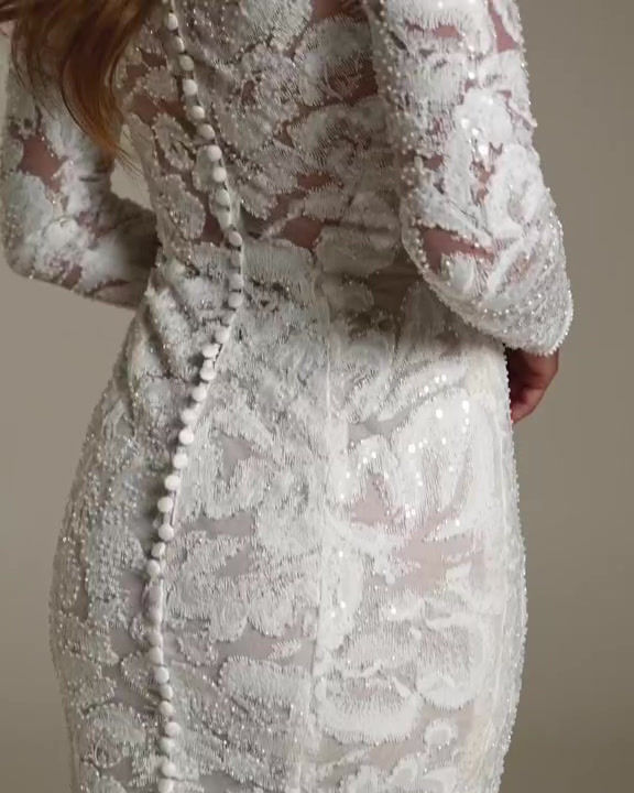 Thumbnail: Video of Sottero and Midgley Holland turtleneck illusion lace sheath bridal gown with a slit