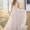 Thumbnail: Front view of Maggie Sottero Betsy tulle A-line wedding dress with illusion cut-outs and pearl detail