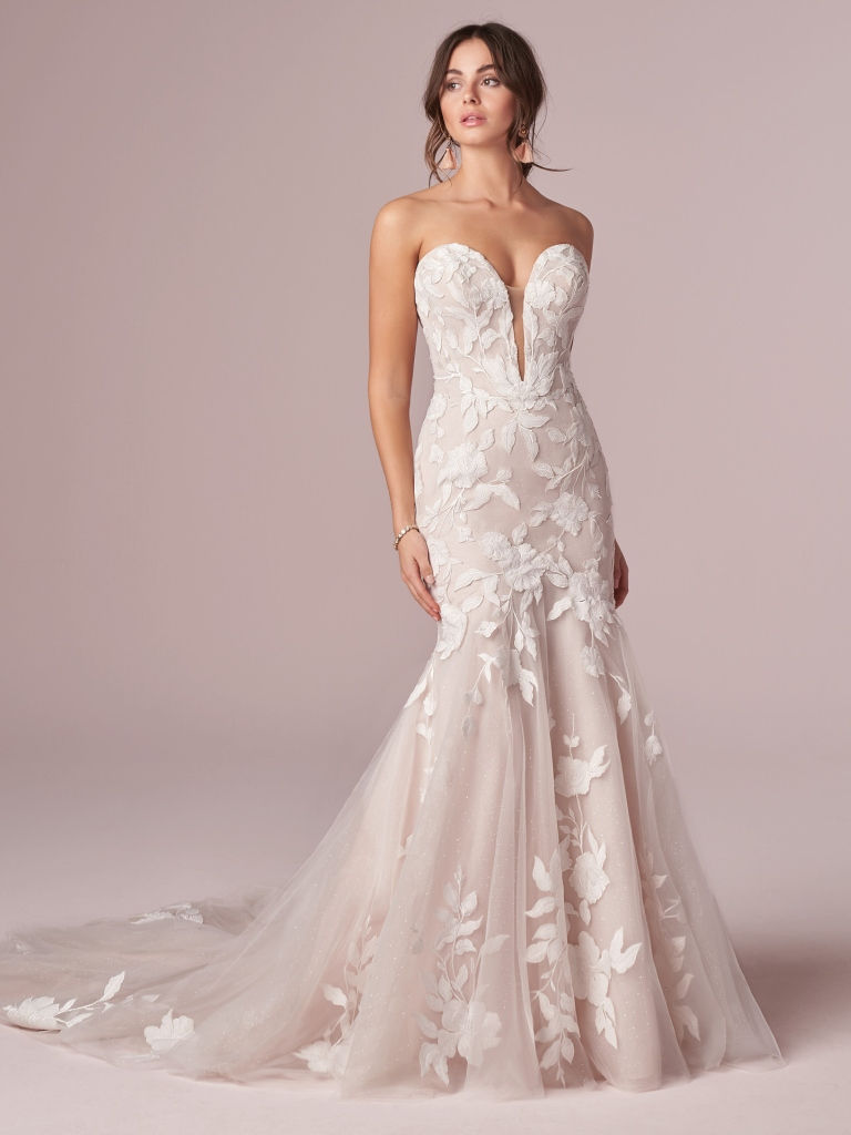 front view of Rebecca Ingram Hattie large floral applique fit and flare wedding dress with plunging neckline