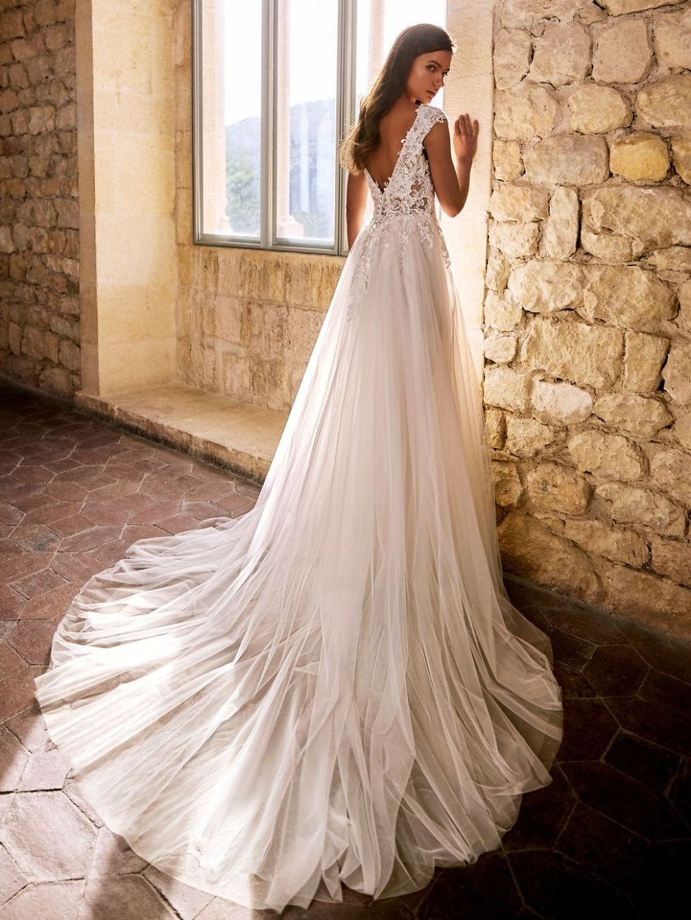 Thumbnail: Back view of Gemmah Etoile wedding dress with Beaded Baroque Lace, Corded Floral Lace and Tulle skirt