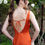 Thumbnail: Close up of back Honora HN4011 bridesmaid dress with cowl neckline in burnt orange colourway
