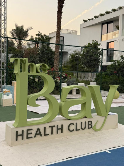 Health club glass branding with frosted vinyl graphics and entrance signage