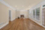 Atlanta real estate photography of empty living room with fireplace