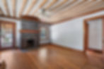 Atlanta real estate photography of room with stone fireplace