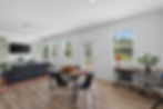 Atlanta real estate photography of a modern open-plan living and dining area.