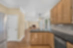 Atlanta real estate photography of kitchen and living room