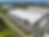 Aerial view of modern commercial warehouse buildings.