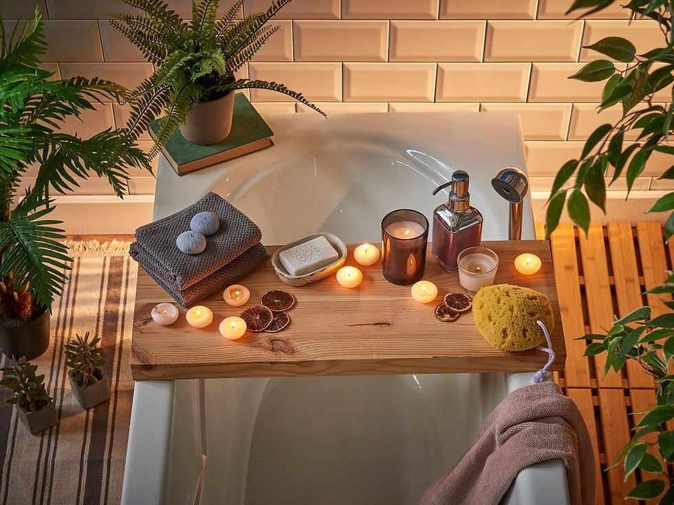 Warm, candlelit bath setup with towels, natural décor, and calming spa elements designed for relaxation and stress relief.