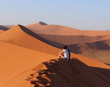 Couple on sossusvlei dunes.jpg