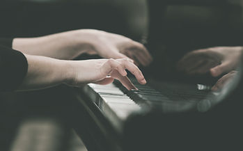 Hands girl playing piano