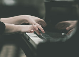 Hands girl playing piano