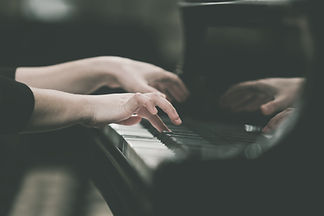 Hands girl playing piano