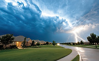 vecteezy_a-lightning-bolt-is-seen-over-a-residential-neighborhood_60287094.jpeg