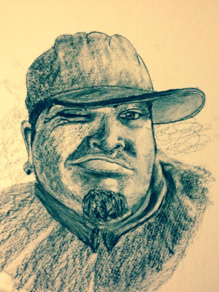 charcoal drawing of man wearing a hat with his lip stuck out