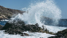 waves crashing against rocks
