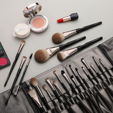 makeup and makeup brushes laid out
