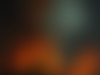 A lone figure kneels amidst intense orange flames, holding a staff. Dark, smoky background adds a dramatic, intense mood.
