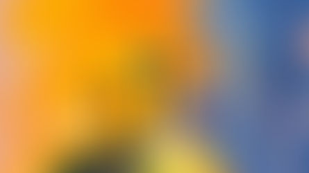 Three crosses on a hill against a vivid orange, blue, and yellow painted sky in an abstract scene