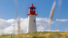 lighthouse in a field