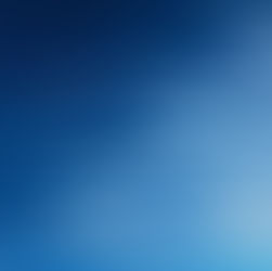 Wispy white clouds stretch across a bright blue sky, creating a serene and peaceful atmosphere. No text is visible.