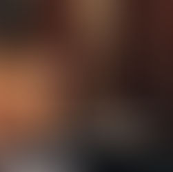 women sitting in coffeeshop having coffee with a friend