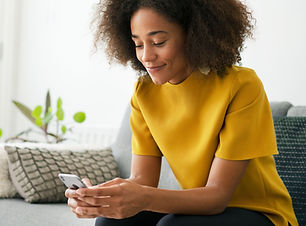 Happy Girl Texting_edited_edited.jpg