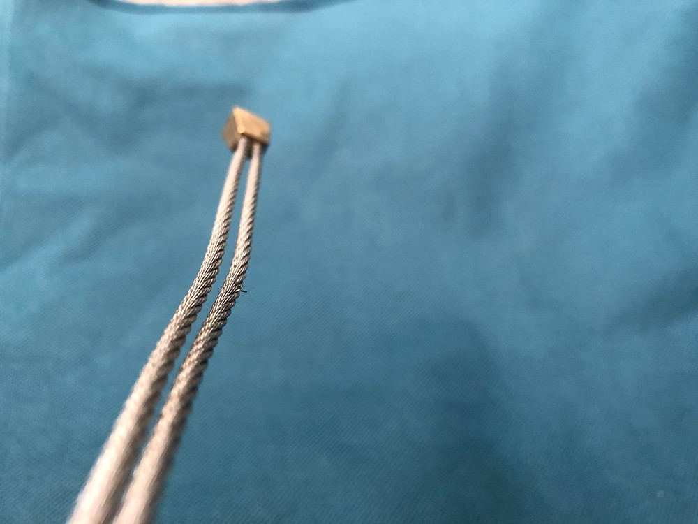Nut with a broken strand