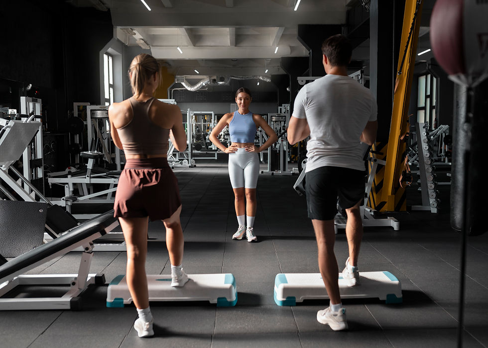 woman-helping-man-gym (1).