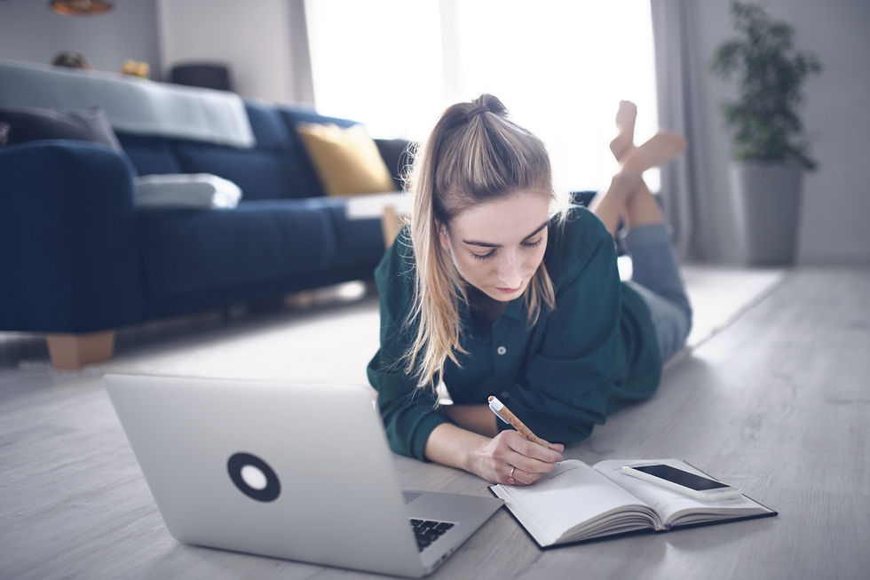 young-woman-student-with-laptop-and-smartphone-at-2022-01-19-00-09-51-utc_edited.jpg