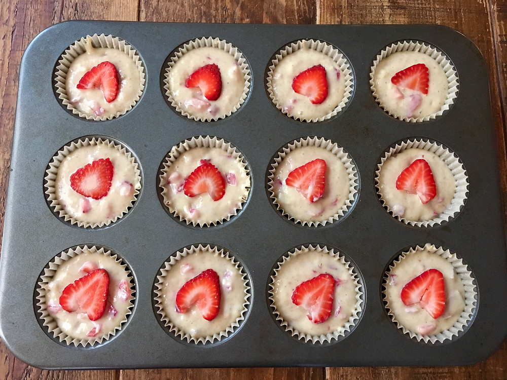 Muffin tin of 12 strawberry rhubarb muffins