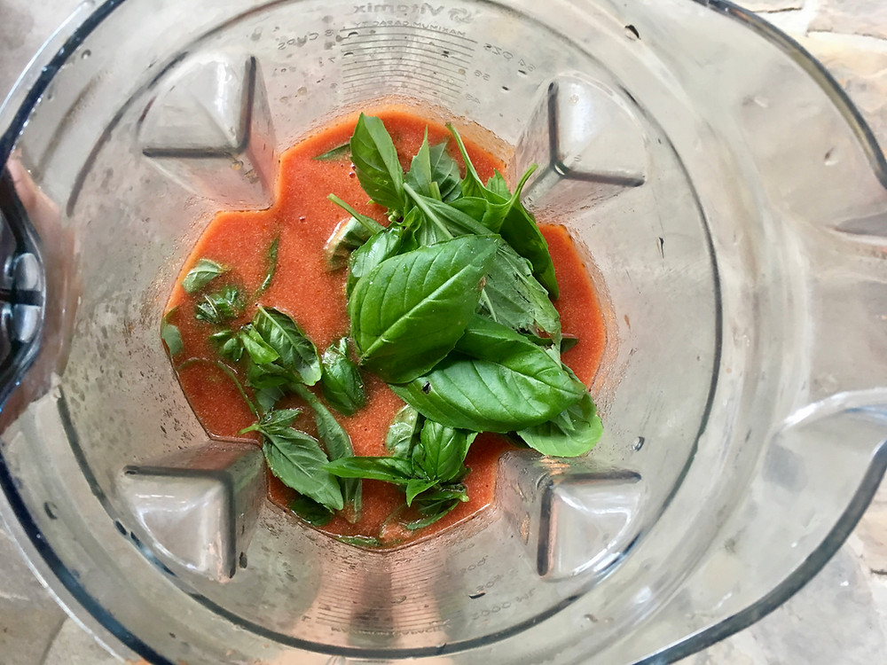 Blender of tomato basil soup ingredients