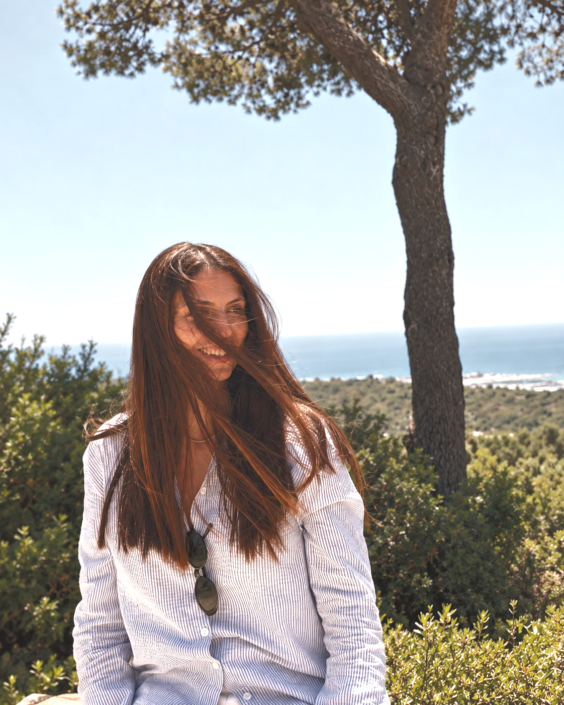 Sunlit Coastal Portrait Beneath a Tree_edited.jpg
