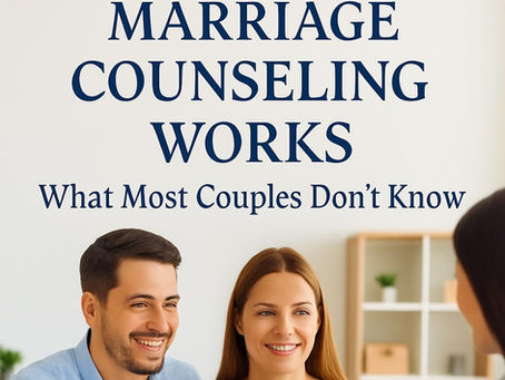 A man and woman sit close together, smiling warmly during a counseling session. Natural light fills the room, suggesting comfort, progress, and emotional safety