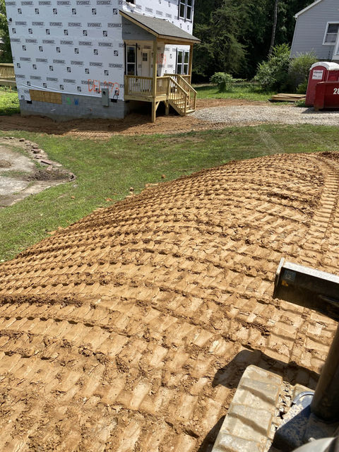 small hill grading in a backyard