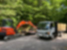 Excavator and truck with materials