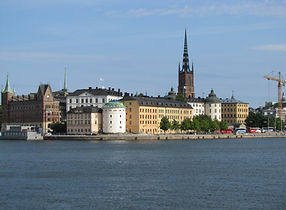 People in front of Brandenburg Gate in Berlin, Germany' populat gay travel destination