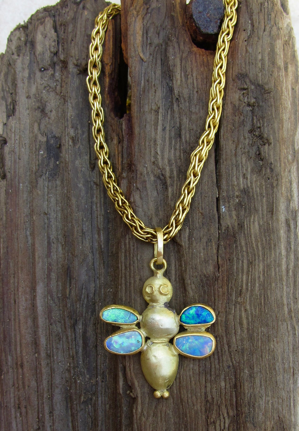 Thumbnail: Golden bee with opal wings