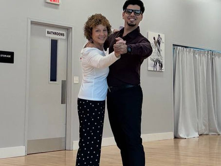 Professional dance instructor teaching student dance lessons in Sarasota, FL.