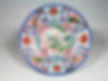 An early 18th C enamelled and underglaze blue Kraak-style Arita dish, c1700