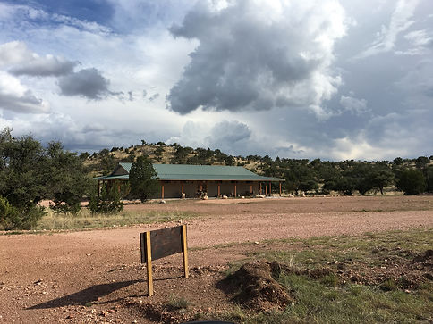 old spanish trail gallery and museum on davis mts ranchland under a cloudy summer sky in west texas